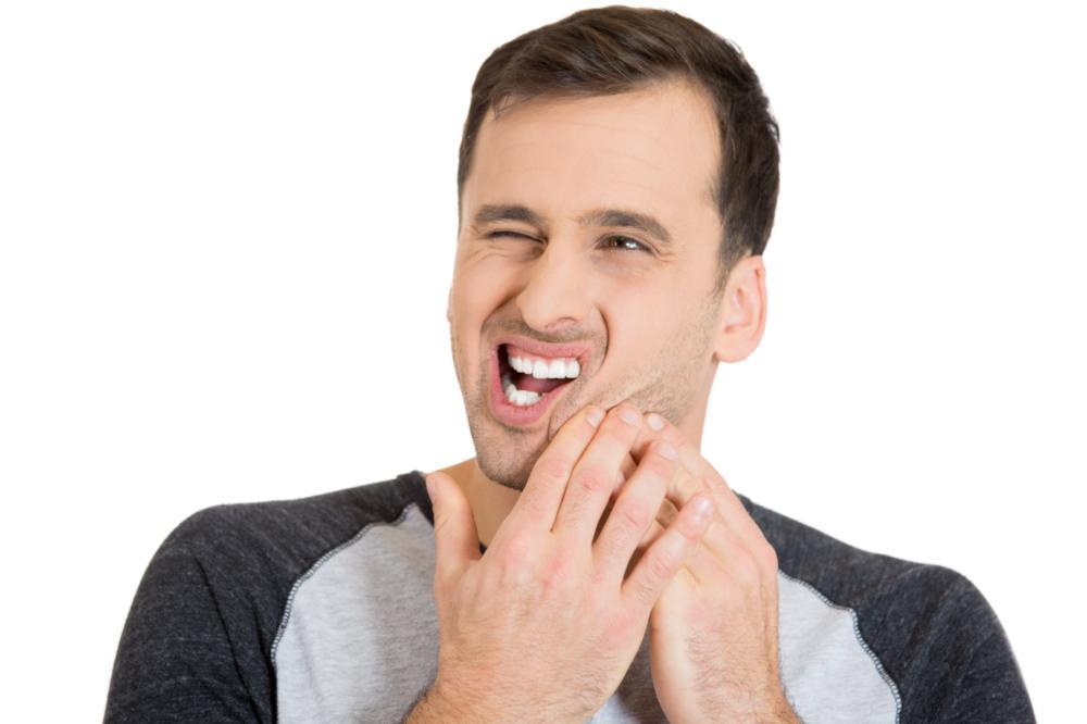 Man with TMJ Pain | TMJ Treatment in Fairfax Man with TMJ Pain | TMJ Treatment in Fairfax